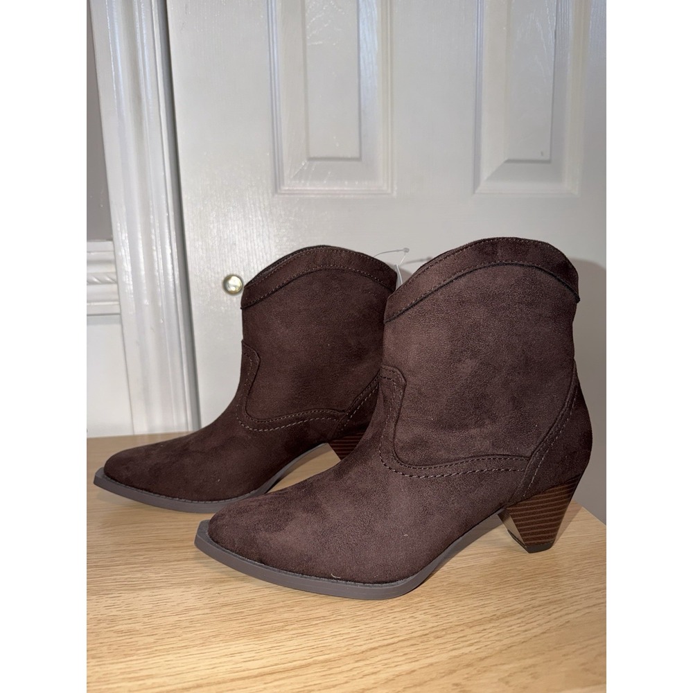 Brown suede ankle boots with a western vibe